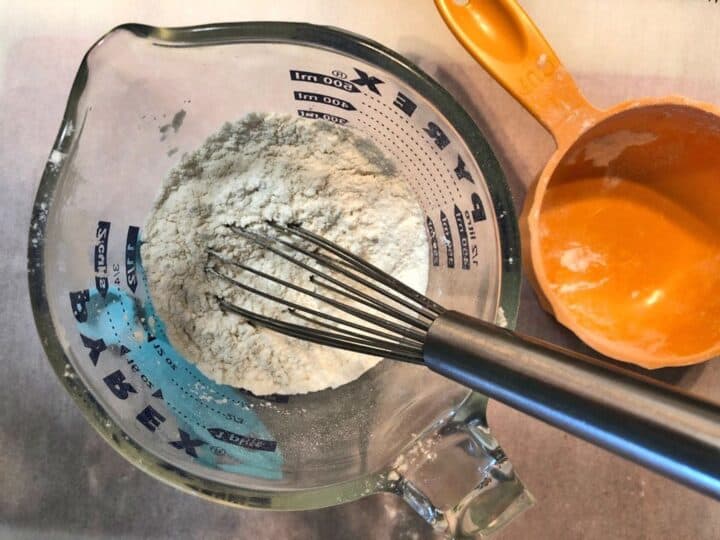 measuring cup with flour