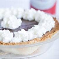 smaller chocolate cream pie in a flaky crust