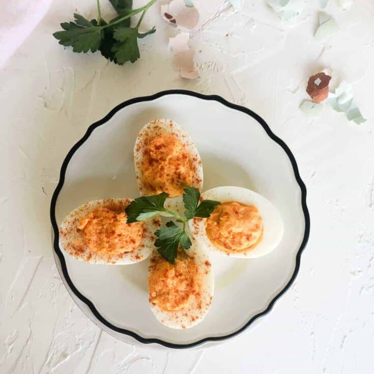 Deviled eggs on plate.