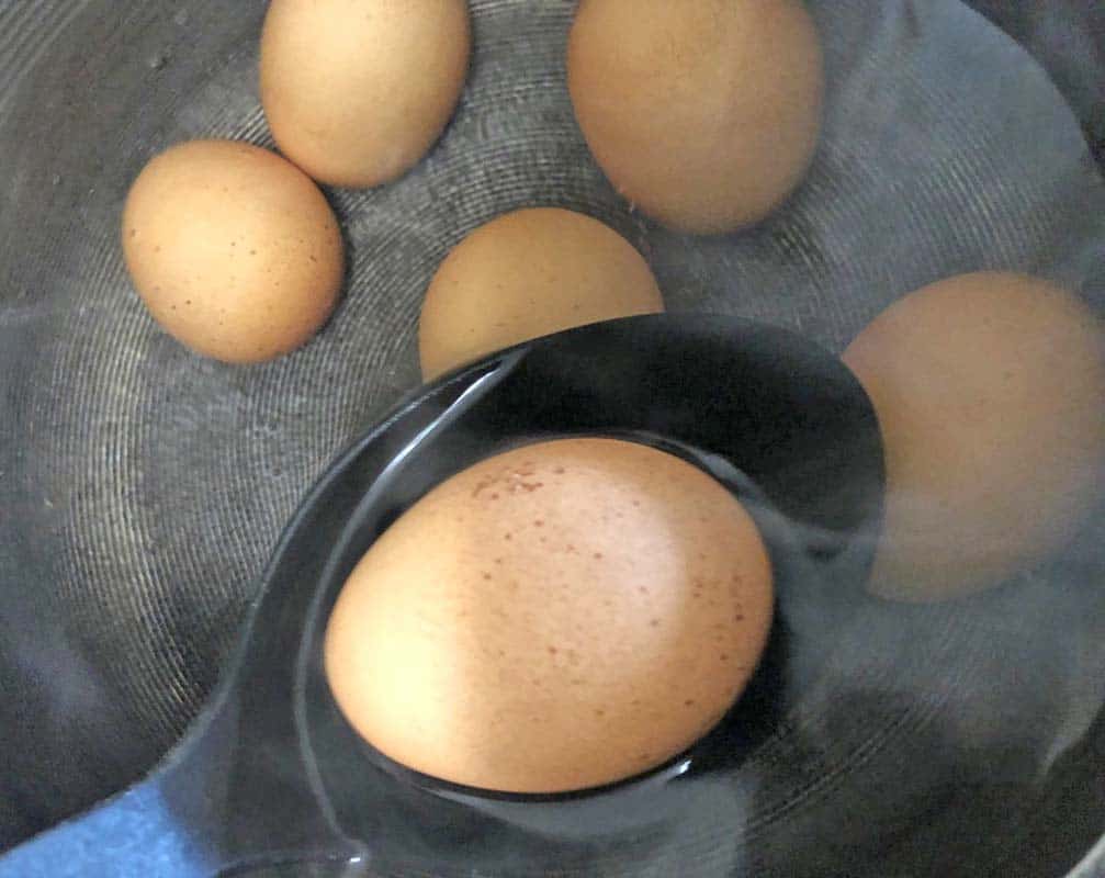 eggs boing in saucepan