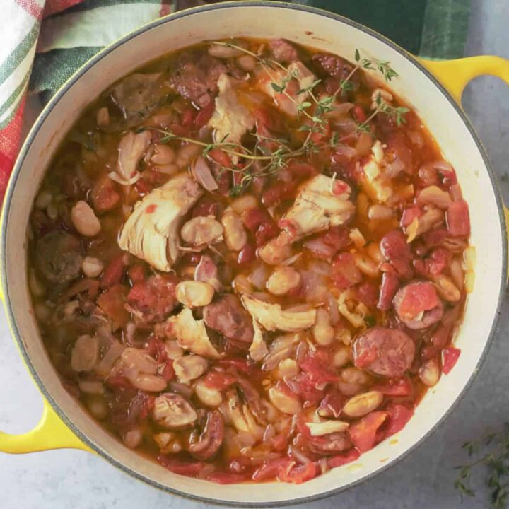 bean and sausage stew in dutch oven