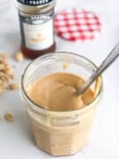 Peanut butter in repurposed jelly jar.