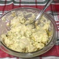 homemade potato salad in clear bowl