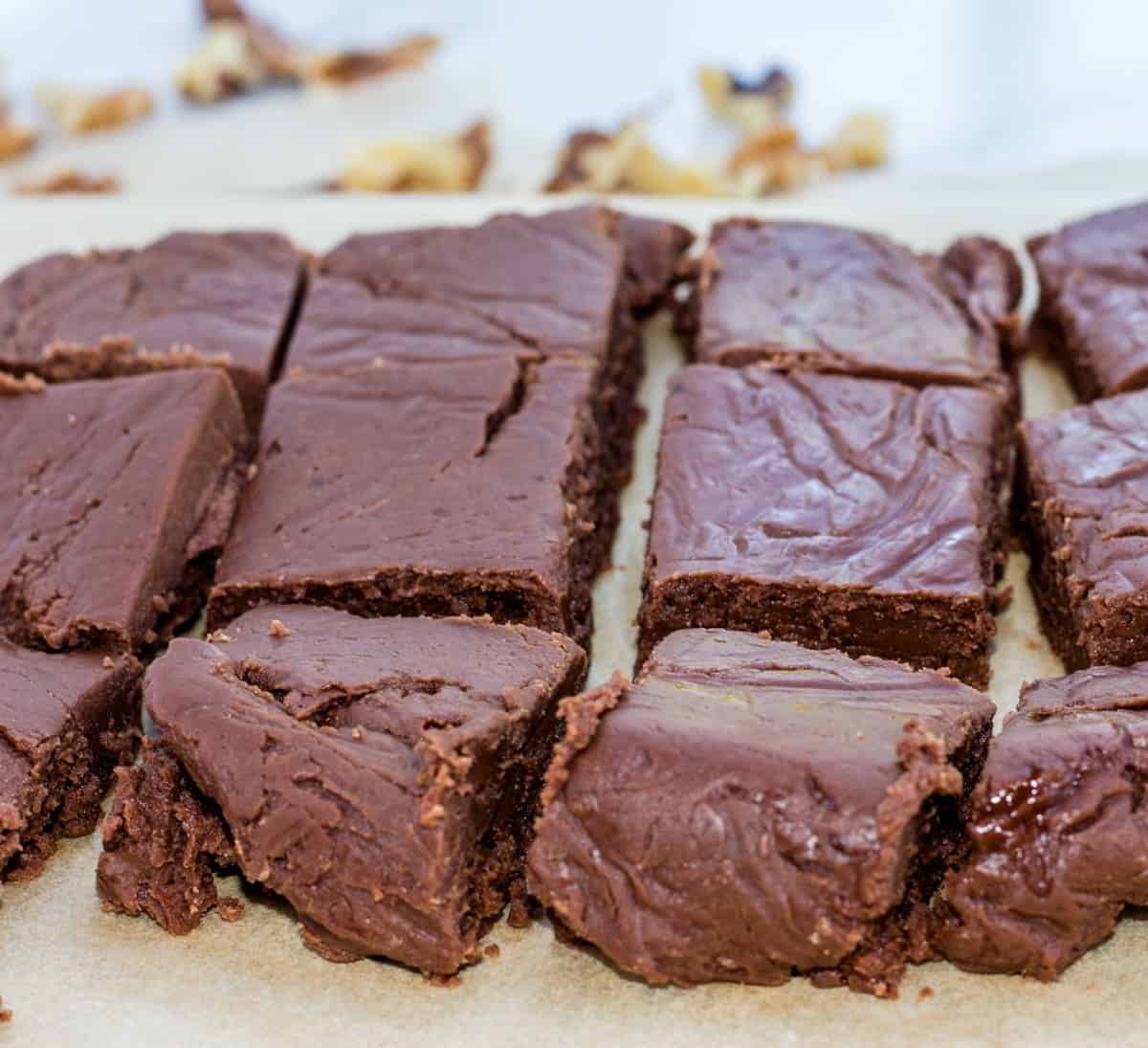 fudge squares on parchment paper.