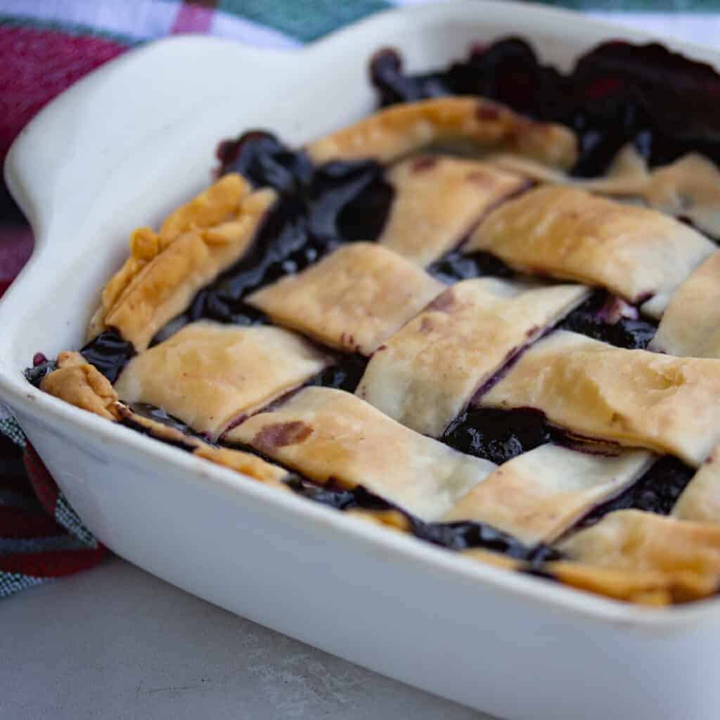 blueberry pie in samll rectabgular baking dish.
