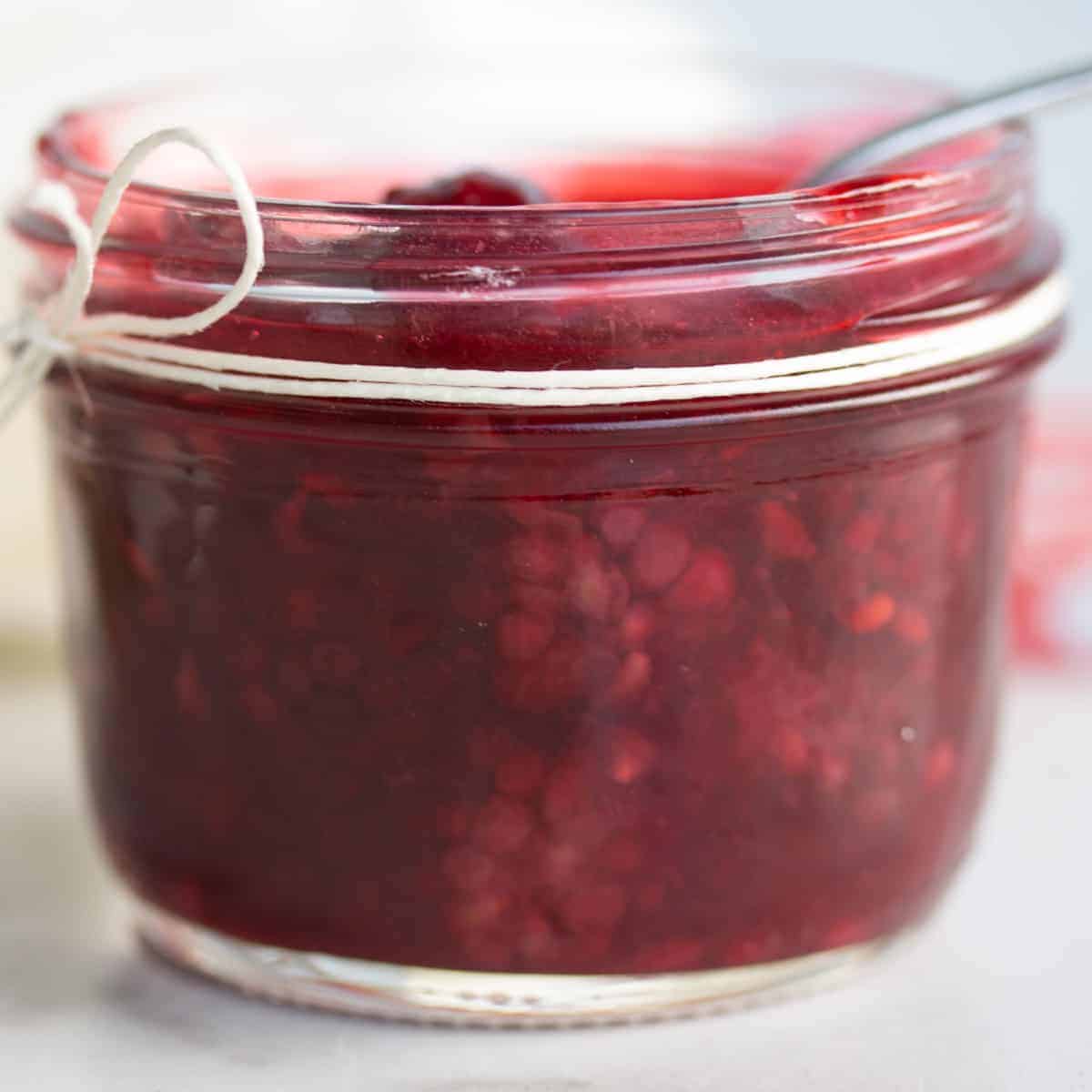 small jar of blackberry jam.