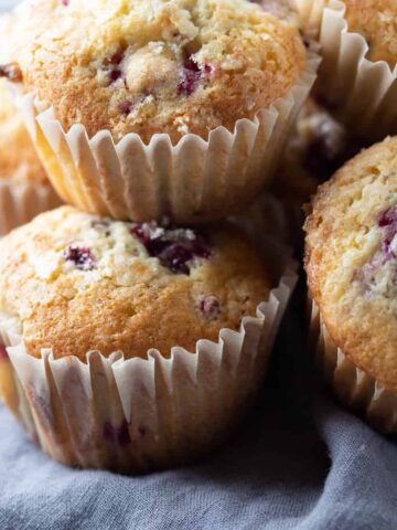 blackberry muffins on linen napkin.
