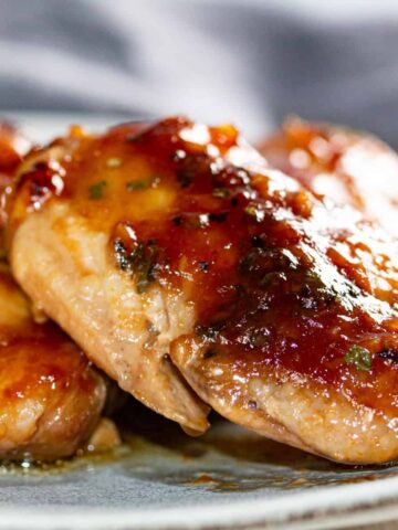 honey garlic chicken thighs on plate.