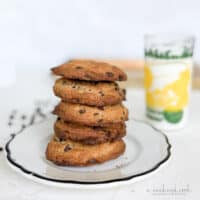 Bisquick chocolate chip cookies stacked on plate.