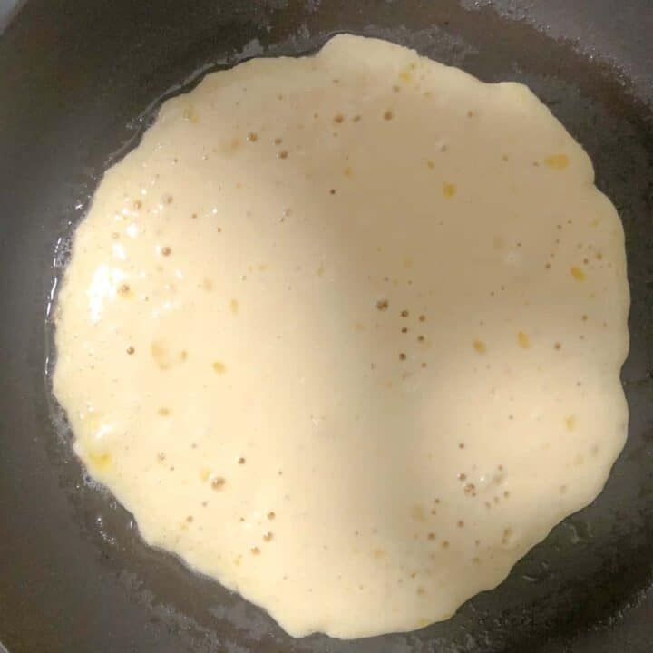 pancake batter in skillet.