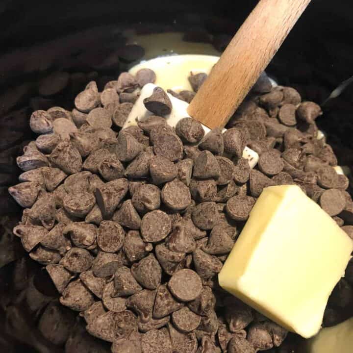 milk, chocolate chips, and butter in a small slow cooker.