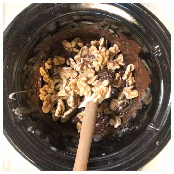 fudge and nuts cooking in small slow cooker.