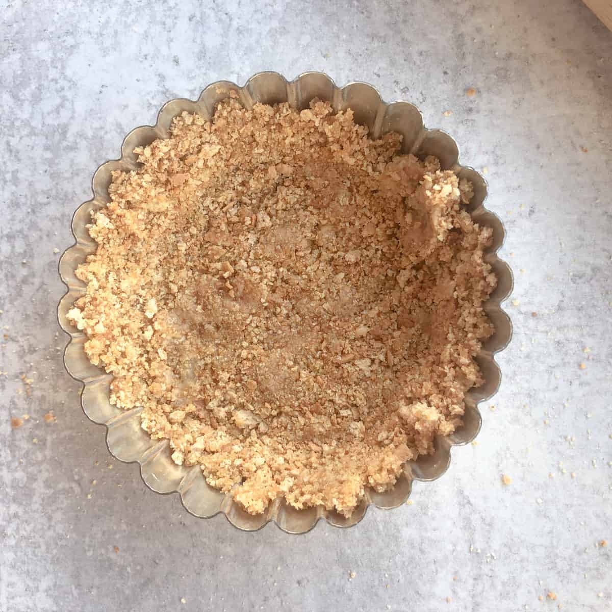 Graham cracker crust in 4-inch tart pan.