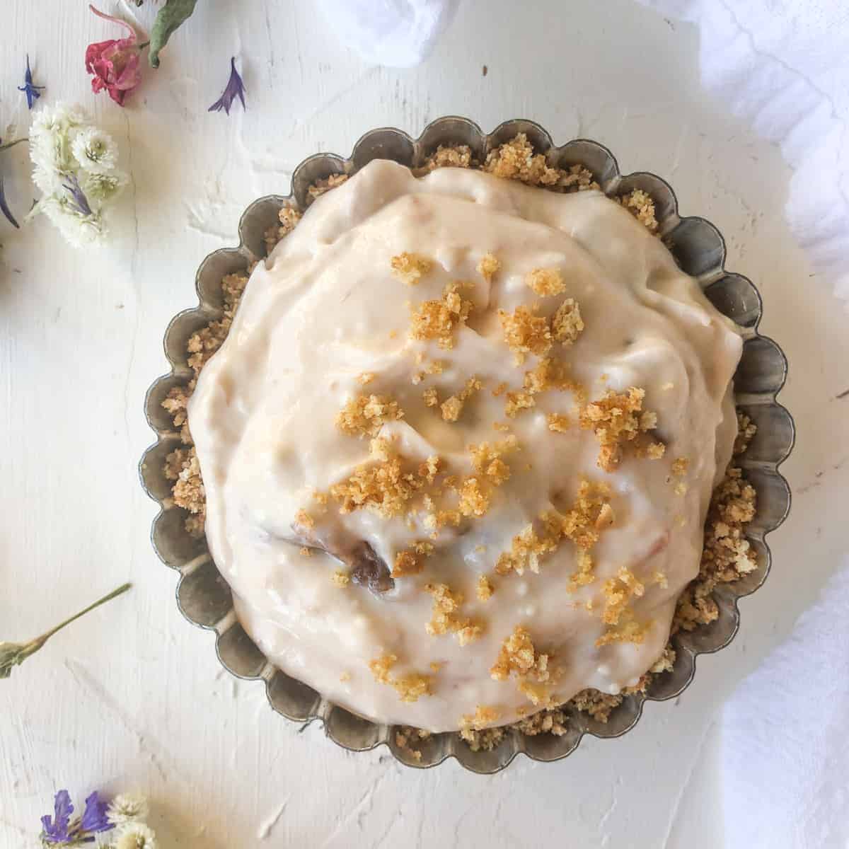 overhead view of no bake cheesecake for one in a 4-inch tart pan.