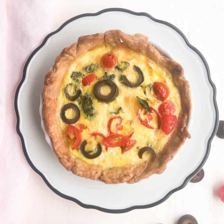 Individual quiche in small tart pan.
