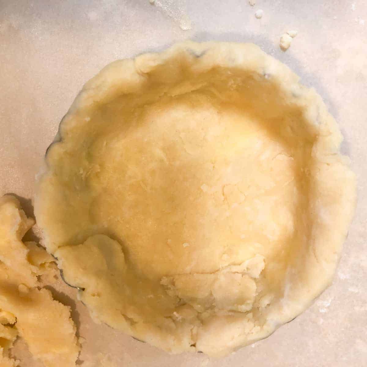 Mini pie crust in 4-inch tart pan.