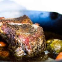 Pot roast in cast iron skillet.