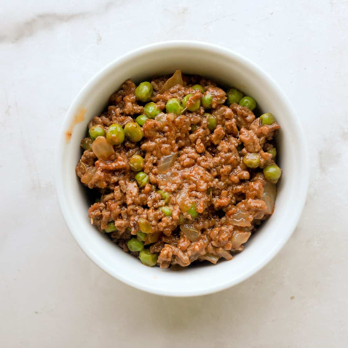 Round baking dish with ground beef filling
