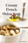 A bowl of single serving French onion soup topped with bread and cheese, with Creamy French Onion Soup text above.