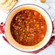 Dutch oven with cooked cowboy stew.