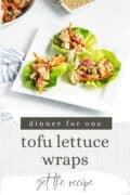 Three tofu lettuce wraps on square white plate.