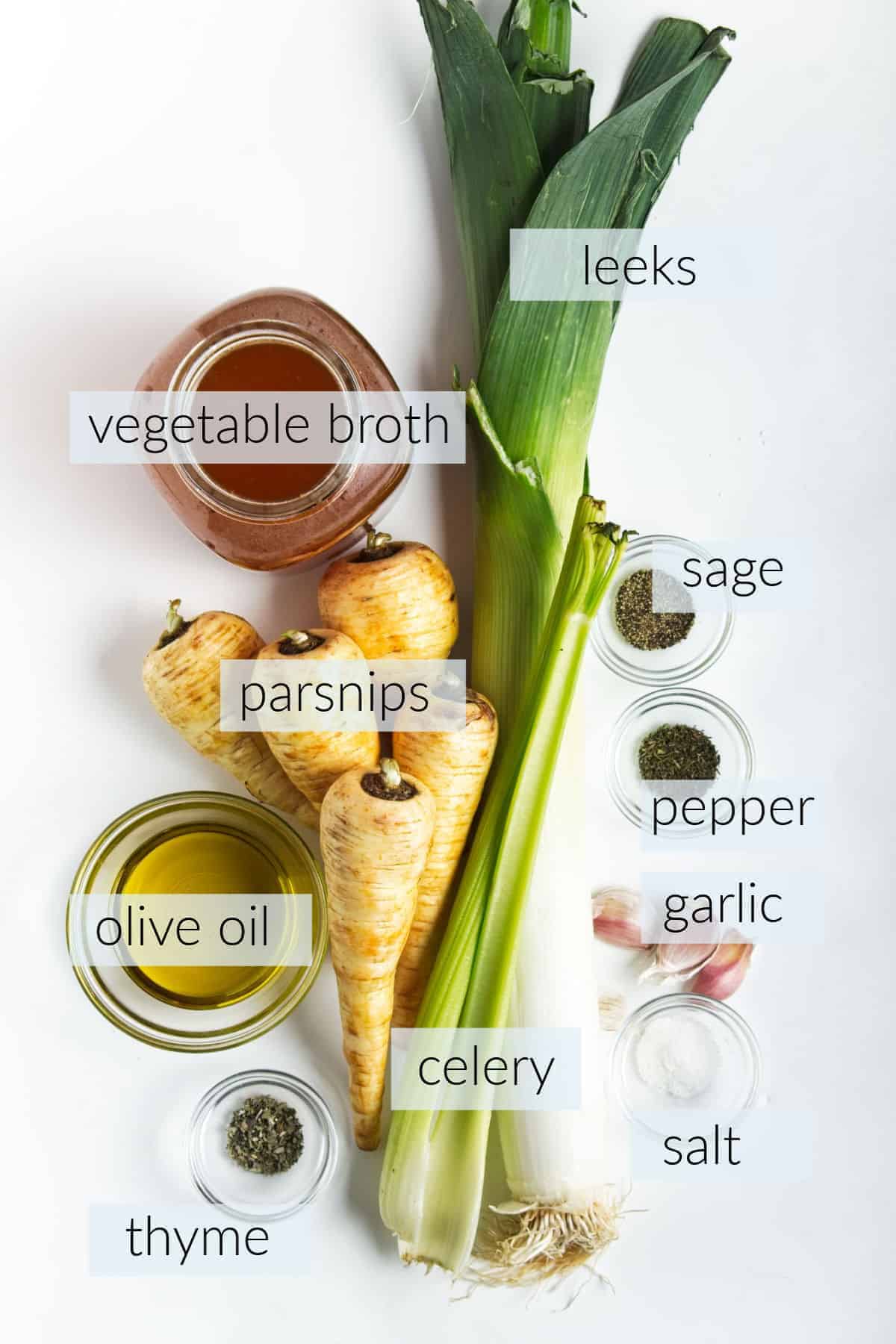 Fresh Parsnips, leeks, celery olive oil, vegetable broth and seasonings measured out of white board.