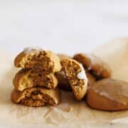 Ginger cream cookies on parchment paper.