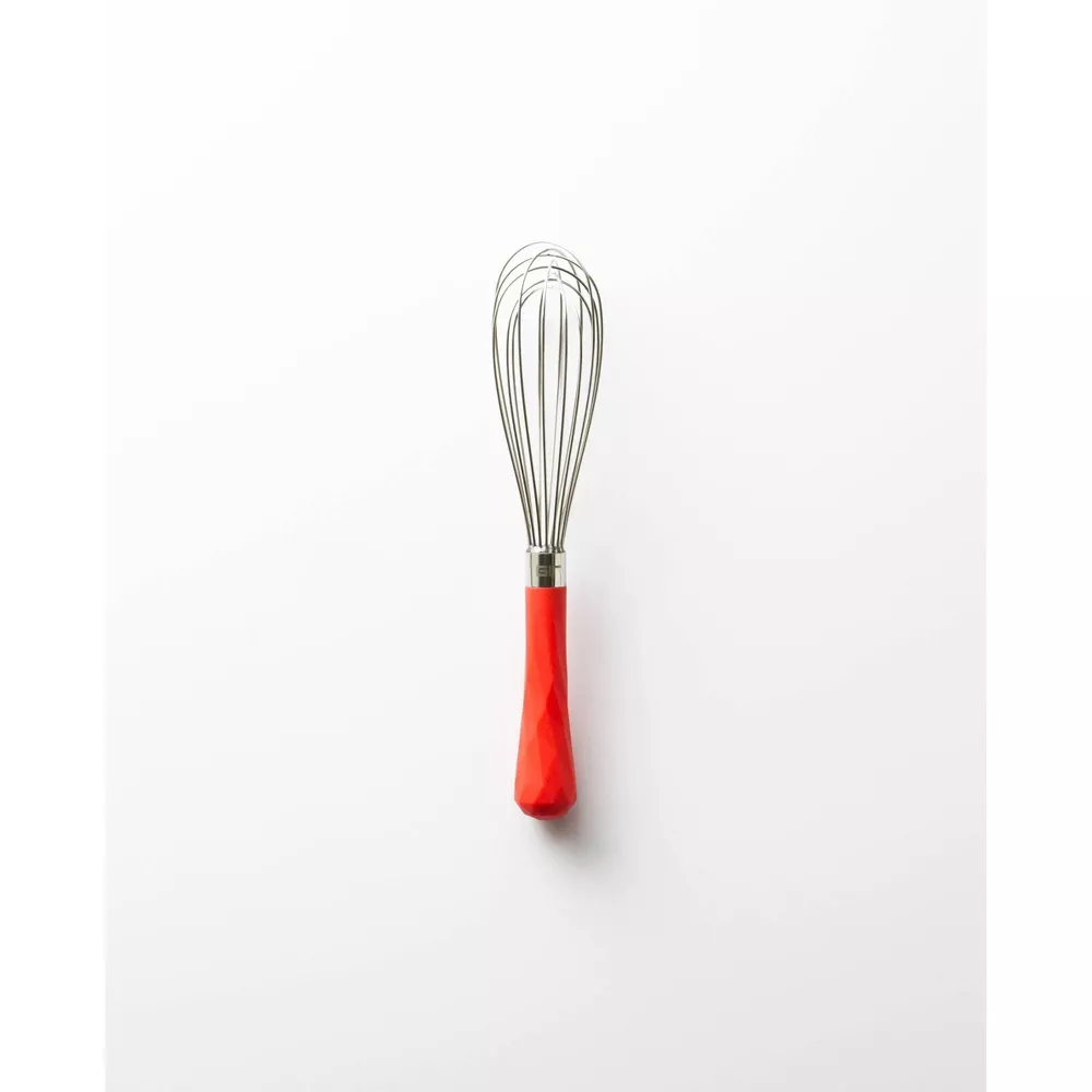 Whisk with red handle.