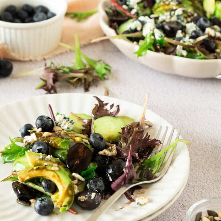 Plate of blueberry and blue cheese salad. .