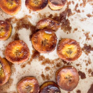 Pan fried slices of plantains sprinkled with brown sugar and cinnamon.