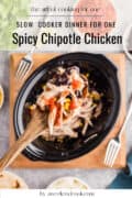 A wooden spoon scoops spicy chipotle chicken with corn and black beans from a slow cooker. Recipe title and website branding are visible.
