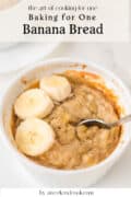 A small ramekin of banana bread topped with banana slices and a spoon, with text detailing a recipe for baking banana bread for one.