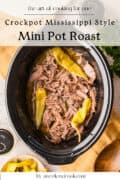 Shredded pot roast with pepperoncini peppers in a slow cooker, surrounded by a napkin, herbs, and small bowls, with recipe text above and website credit below.