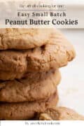 A close-up of a stack of peanut butter cookies with text overlay reading Easy Small Batch Peanut Butter Cookies by aweekendcook.com.