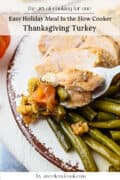 A plate with sliced turkey, stuffing, and green beans, with a fork holding a piece of turkey. Text above reads “Easy Holiday Meal In the Slow Cooker: Thanksgiving Turkey.”.