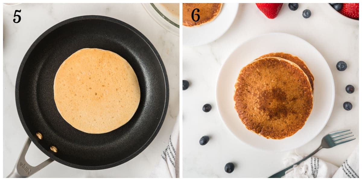 Left: A pancake cooking in a black frying pan. Right: A stack of cooked pancakes on a white plate, surrounded by blueberries and strawberries.