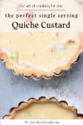Two small, single-serving quiches with custard filling sit in fluted tart pans on a light surface. Text overlay reads, the perfect single serving Quiche Custard.