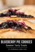 Close-up of blueberry pie cookies with golden, flaky crusts and rich blueberry filling. Text below reads: “BLUEBERRY PIE COOKIES Summer Tasty Treats by thebuttercookie.com”.