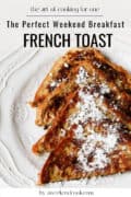 Four slices of French toast topped with powdered sugar are arranged on a white plate. Text on the image promotes French toast as a perfect weekend breakfast for one.