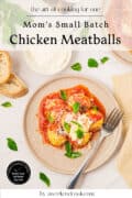 Plate of Small Batch Chicken Meatballs in tomato sauce with grated cheese and basil, a fork, slices of bread, ricotta in a bowl, and a napkin on a light table. Recipe title text is overlaid.