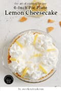 6-inch no-bake lemon cheesecake in a pie plate, topped with whipped cream and lemon slices.
